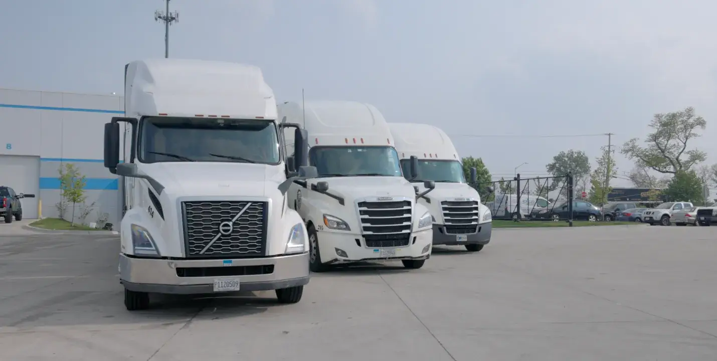 trucks and cars in the parking area