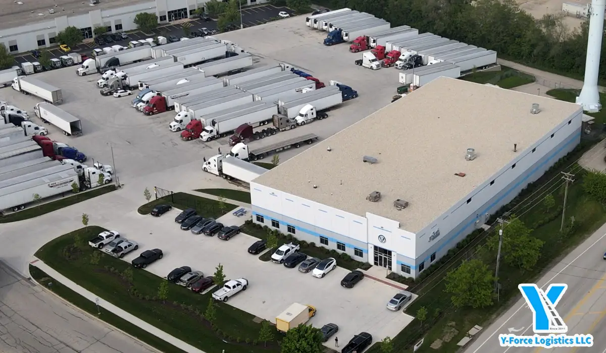 Warehousing Management | aerial shot of a warehouse and cargo trucks
