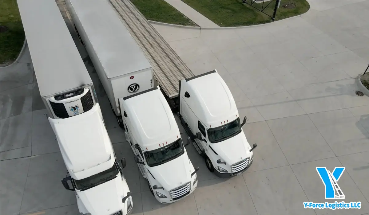 three long cargo trucks for international logistics services