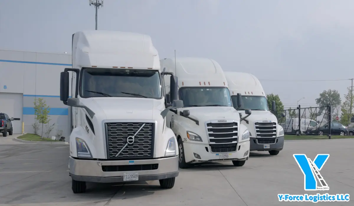 three white cargo vans for freight transportation